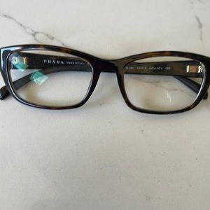Prada frames.